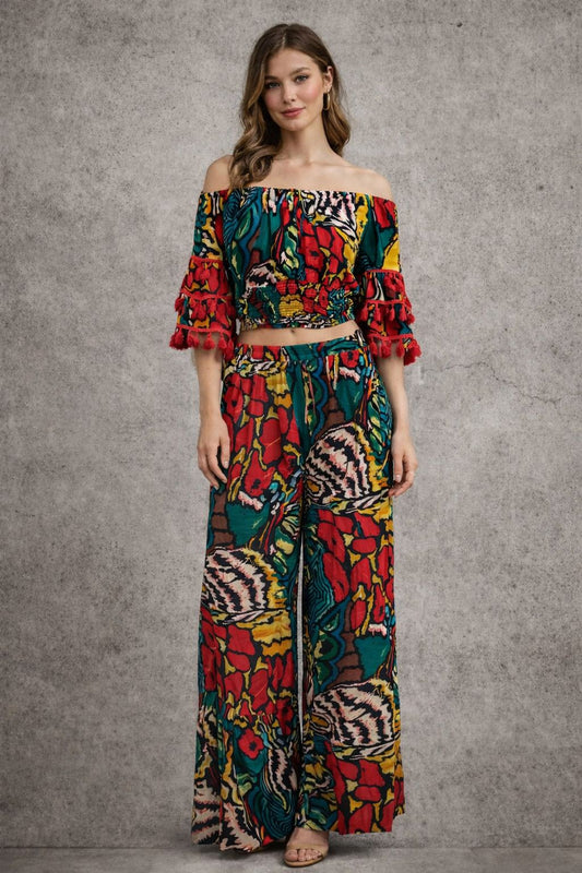 Pants set with an off-shoulder top with wide sleeves